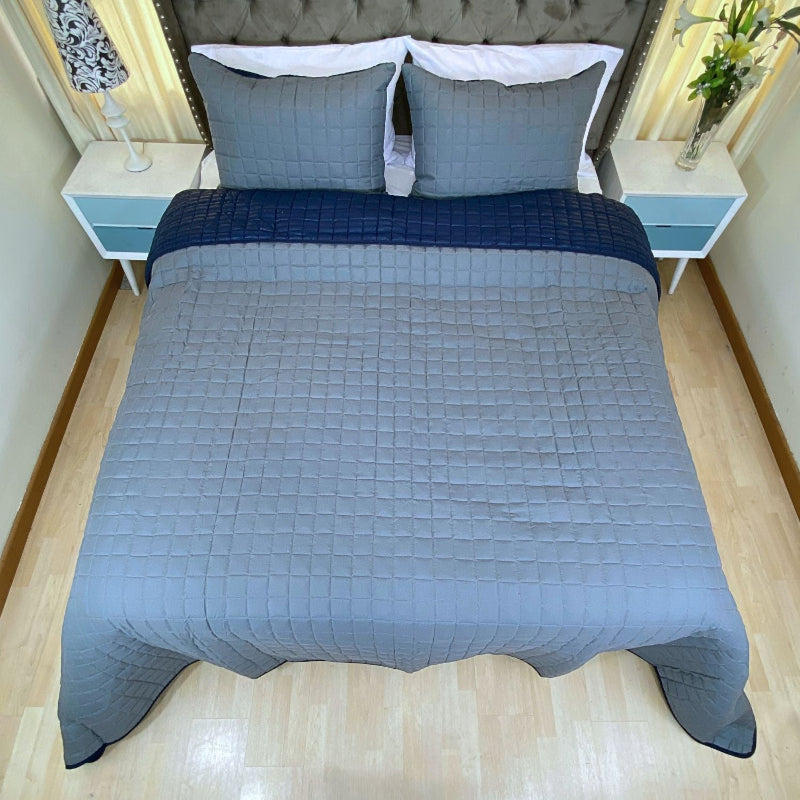 Edredón quilt doble faz azul-gris